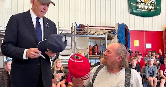 Biden Briefly Put on a Trump Hat, and MAGA World Flipped Its Lid