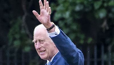 King Charles waves at wellwishers as he boards his helicopter