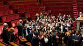 French parties begin talks on forming government after chaotic election