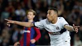 Mbappe scores twice as PSG beat 10-man Barca to reach semi-finals