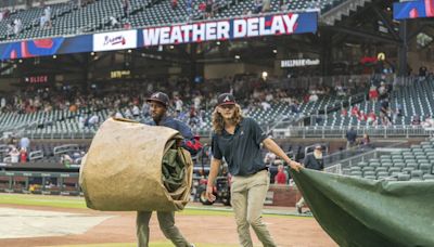 Reds-Braves game is postponed because of rain, doubleheader planned on Wednesday