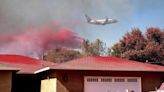 Northern California wildfire does not grow but winds and hot weather could whip up flames