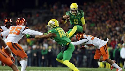 Pac-12 Heisman winners from USC, Oregon offer the ultimate choice