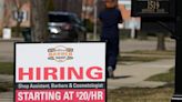 Applications for US unemployment benefits dip to 210,000 in strong job market