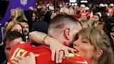 NFL star tight end Travis Kelce of the Kansas City Chiefs, on left embracing singer-girlfriend Taylor Swift, has signed a two-year contract extension to remain with the NFL club through the 2027 season