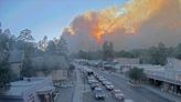 Cool weather could corral blazes that made thousands flee New Mexico village