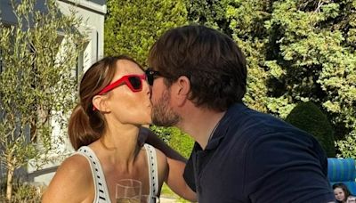 Alex Jones shares rare PDA with husband after moving house