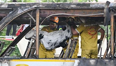 Thai driver faces four charges including reckless driving after school bus catches fire in Bangkok, leaving 23 dead