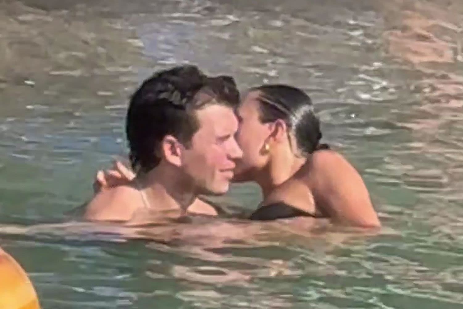 Luke Newton Packs on the PDA with Rumored Girlfriend Antonia Roumelioti During Italian Vacation