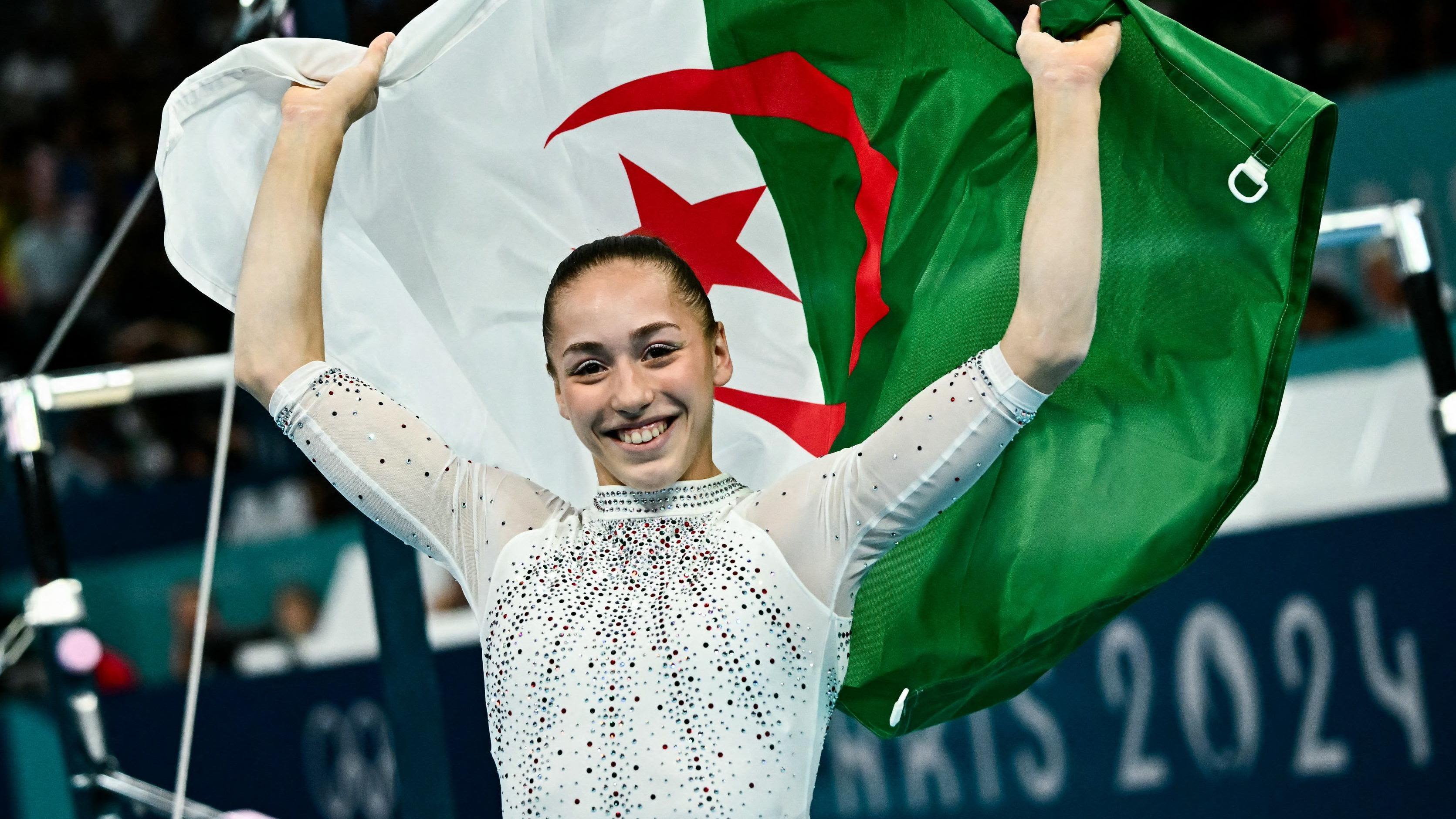 Algeria's Nemour makes history with uneven bars gold