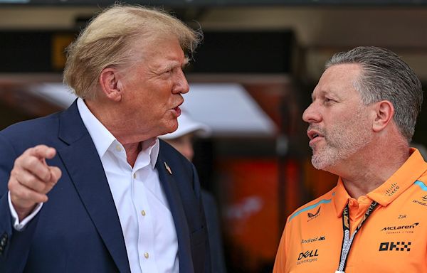 Donald Trump waves to crowd, salutes during national anthem at F1 Miami Grand Prix