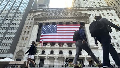 Stock market today: Dow flirts with record as most of Wall Street drifts in mixed trading