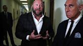 Alex Jones Sent 'Intimate Photo' Of His Wife To Roger Stone, Lawyer Says