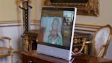 Queen appears on screen for virtual audiences