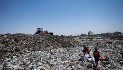 In the searing heat of the Gaza summer, Palestinians are surrounded by sewage and garbage