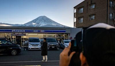 Overrun Japanese town putting up eight-foot barrier to block tourist photos of Mount Fuji