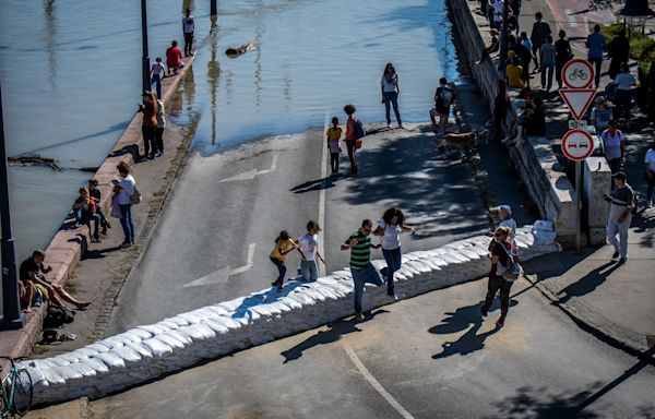 Danube waters reach parliament’s steps as Storm Boris floods Hungary