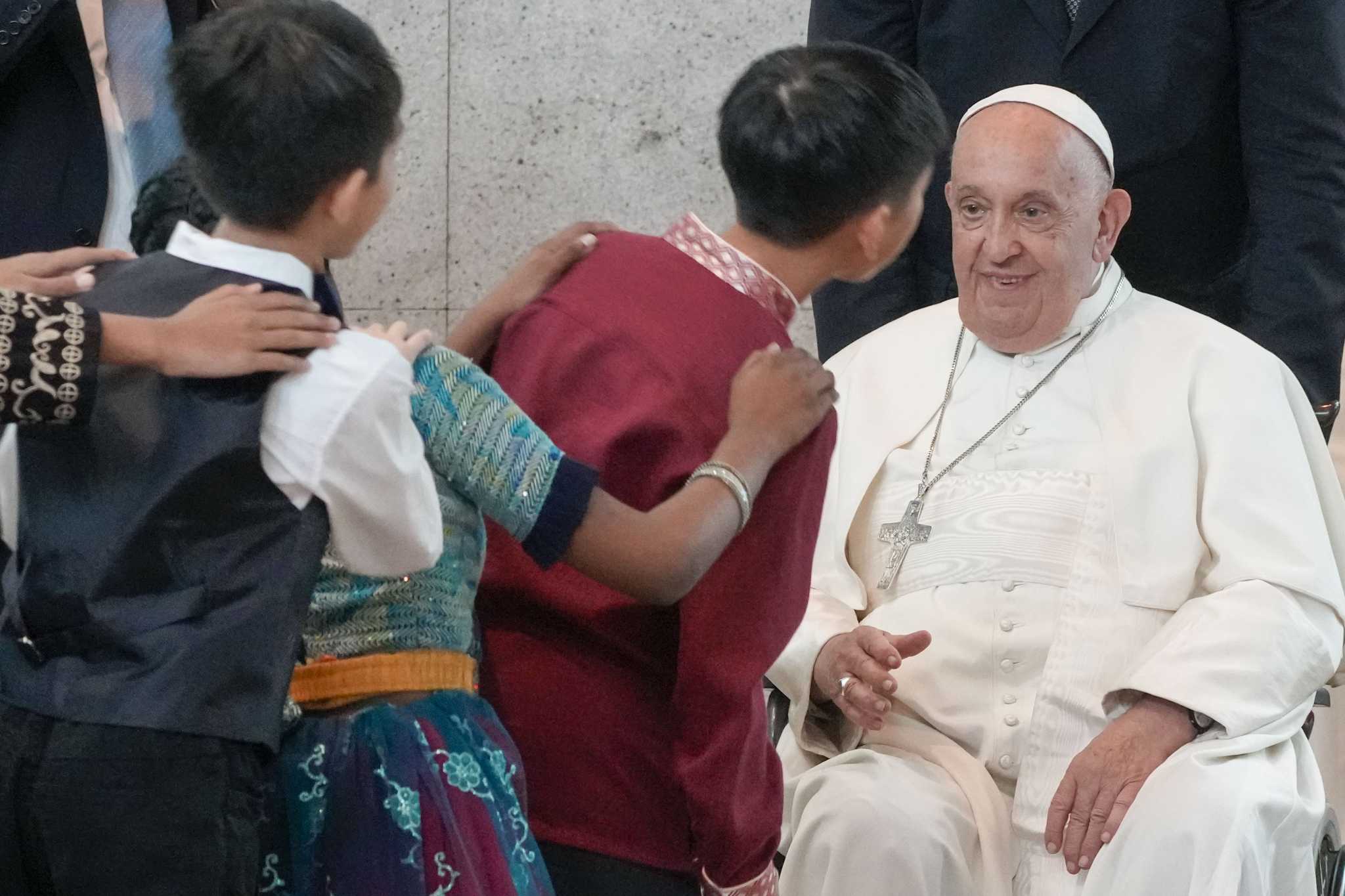 Pope travels from one of the world's poorest countries to one of the richest: Singapore