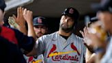 Pujols delivers as Cardinals outlast Reds in 13 innings, 5-3