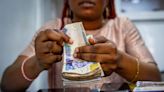 Nigeria’s Dollar Reserves Plunge In Tandem With Naira Rebound