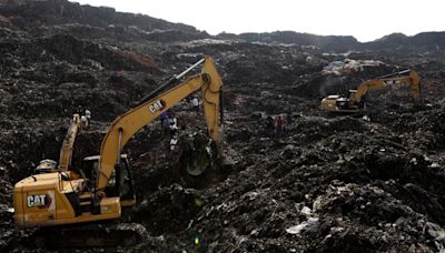 Uganda landfill collapse kills 24 as people buried by rubbish