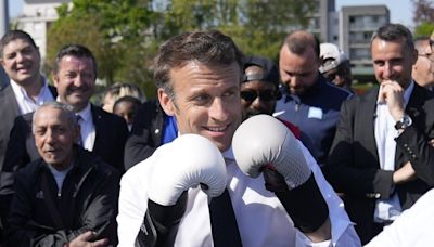 Macron aims to sidestep political concerns and regain prestige with the Paris Olympics