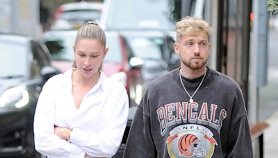 Zara McDermott looks downcast on a stroll with boyfriend Sam Thompson