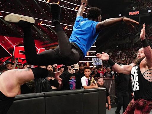 Top WWE star 'given massive fine for throwing fan' at rival in chaotic brawl