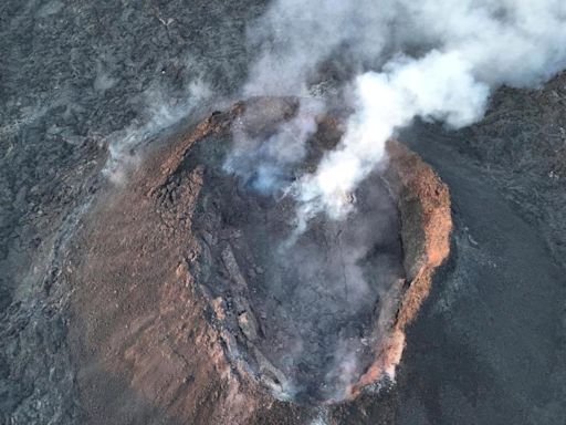 An Iceland volcano starts erupting again, shooting lava into the sky