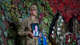 A Russian woman nicknamed 'Simba' who defected and fought for Ukraine buried in a military funeral