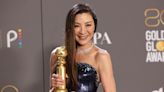 Michelle Yeoh, 60, stuns at the 2023 Golden Globes: 'A living princess'