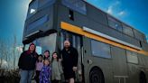 We're a family of six who live on a bus — we've saved £20,000 in three years