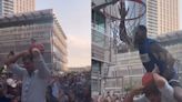 Mavericks Fan Tries to Dunk Over Dirk Nowitzki, Quickly Learns Why That's a Bad Idea