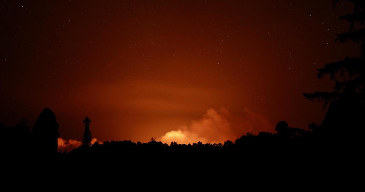 Hawaii volcano erupts, prompting officials to issue warning