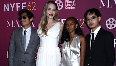 Angelina Jolie's Recovering Son Pax Is All Smiles Alongside Mom and Siblings on Red Carpet After Scary Bike Crash: Photos