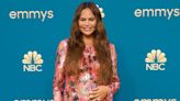 Pregnant Chrissy Teigen Cradles Baby Bump in Pink Sequin Dress at 2022 Emmys