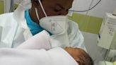 Woman fleeing Haiti gives birth to a baby boy on flight