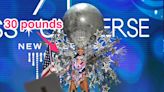 Miss USA wore a 30-pound woman on the moon-inspired costume that spanned over 30 inches in diameter at the Miss Universe pageant