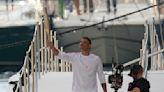 Torchbearers in Marseille kick off the Olympic flame's journey across the country