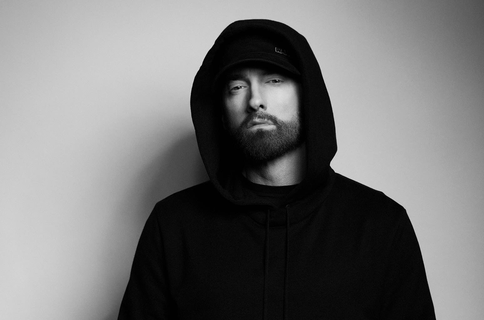 Eminem Brings Out the Body Bag to Reveal ‘The Death of Slim Shady’ Album Cover Art