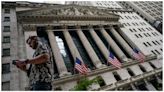 Dow passes 40,000 for first time