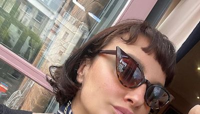 Gizzi Erskine, 43, flaunts her ample cleavage in a teal bikini