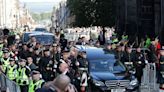 Woman arrested for holding 'anti-monarchy’ sign during Queen's coffin procession