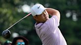 Tom Kim keeps lead as Shane Lowry and Robert MacIntyre shoot into contention