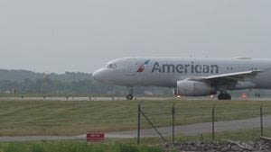 Boston-bound American Airlines plane aborts takeoff to avoid crashing into landing aircraft