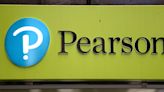 Education group Pearson lifts profit outlook