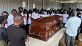 Slain Ugandan Olympian buried with full military honours