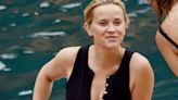 Reese Witherspoon, 48, showcases her cleavage in low-cut bathing suit