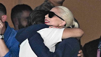 Lady Gaga and Tom Cruise share a friendly hug at the Paris Olympics