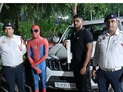 ‘Spiderman’ Spotted Riding On Car's Bonnet in Delhi’s Dwarka, Police Takes Action - News18